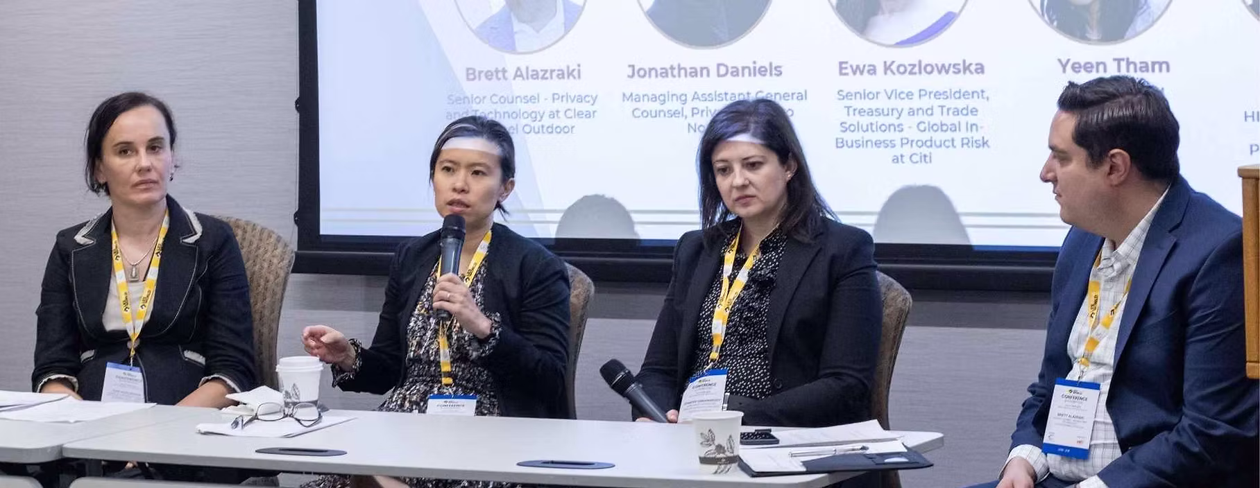 Senior legal professionals in a panel discussion at LexTalk World